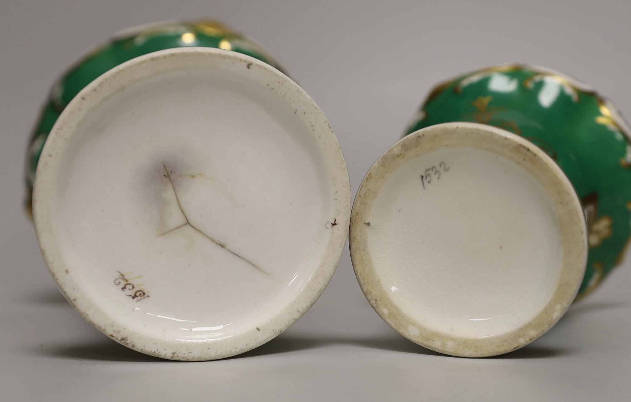 A pair of Rockingham type graduated vases with landscapes, tallest 17cm high